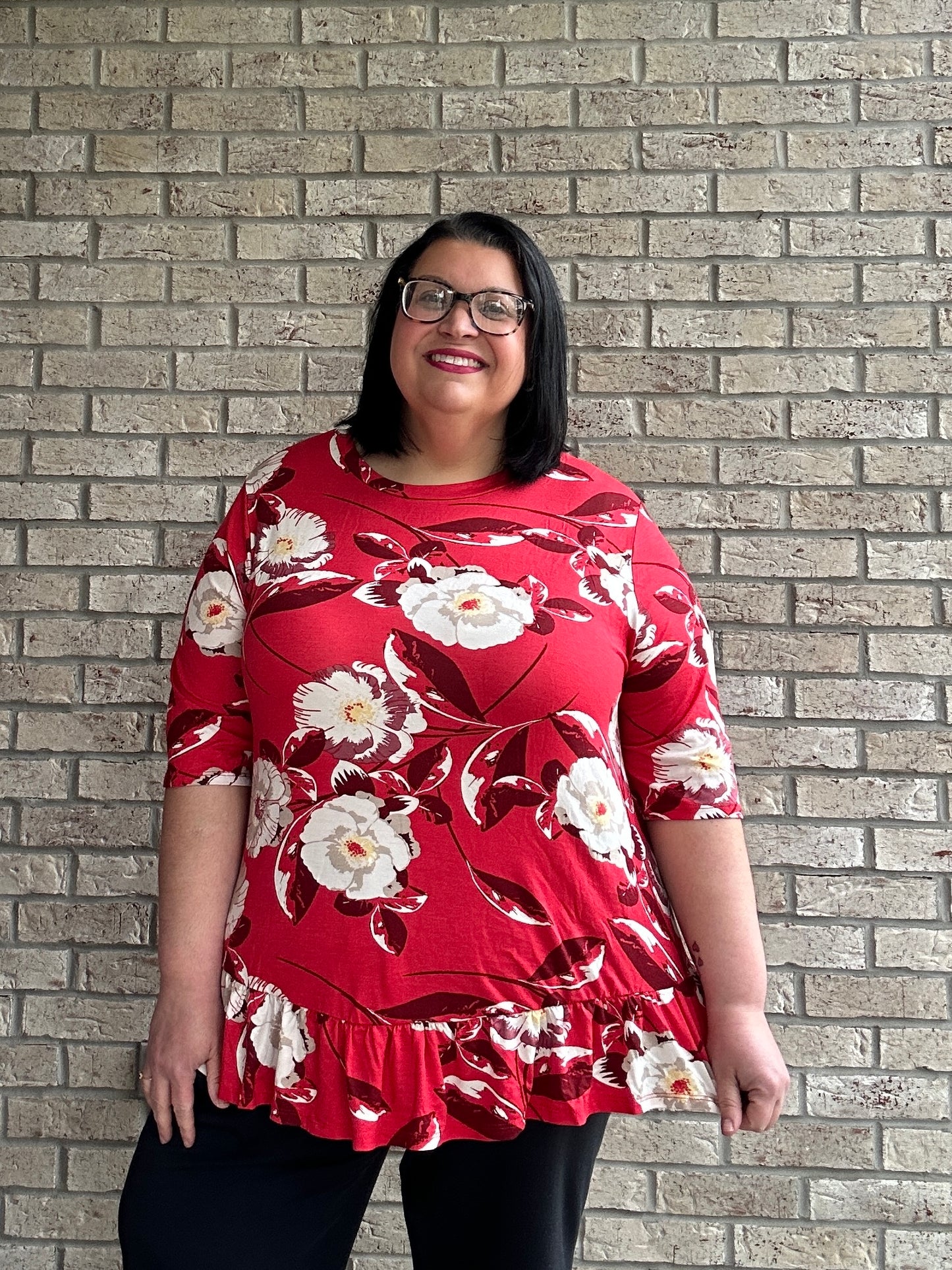 Tonya red floral print ruffle bottom top