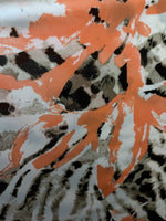 Kensley black orange animal print top with ruffle sleeve